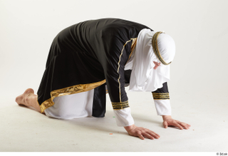 Arthur Fuller Sultan Bowing bowing kneeling whole body 0009.jpg